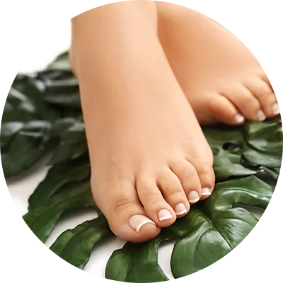 Feet on a green leaves